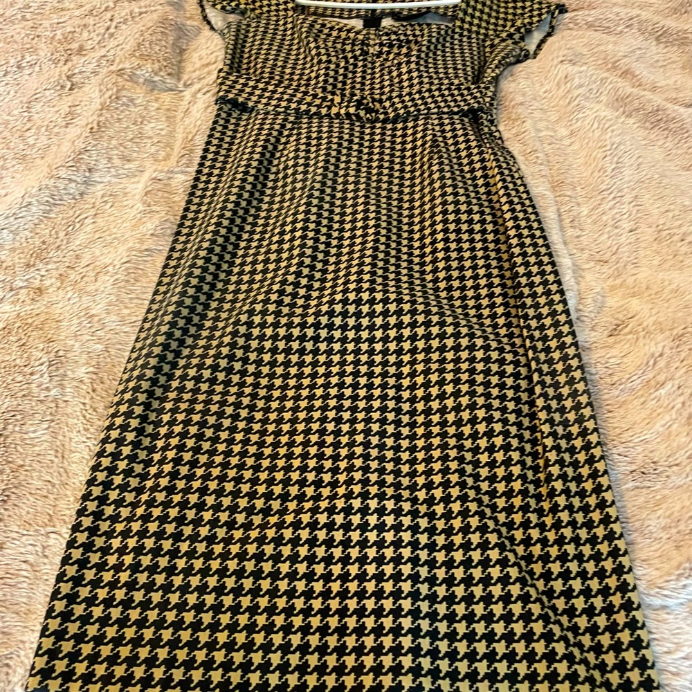 Stop Staring wiggle dress. Size XL, but fits 8 to 10.  Zipper in the back.